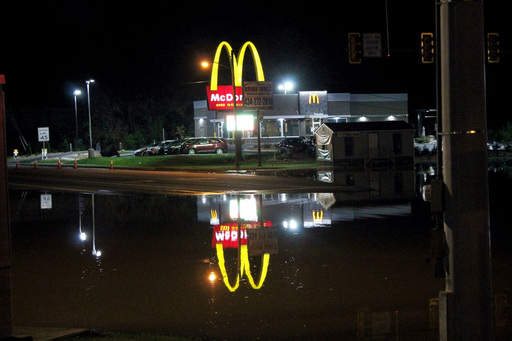 Flood waters reflection Saturday evening.jpg